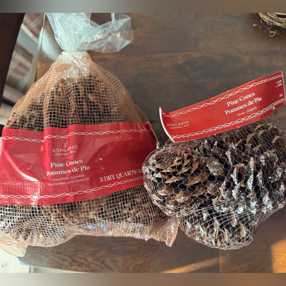 NWT 2 bags of holiday pinecone decor. 1 bag plain pinecones, 1 bag with glitter